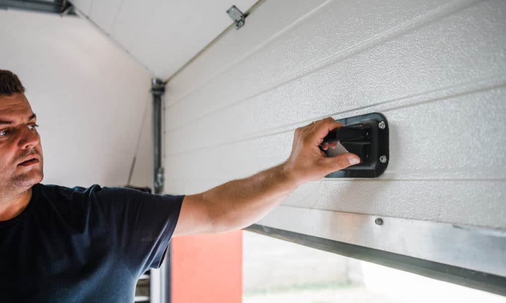 how to reset garage door remote